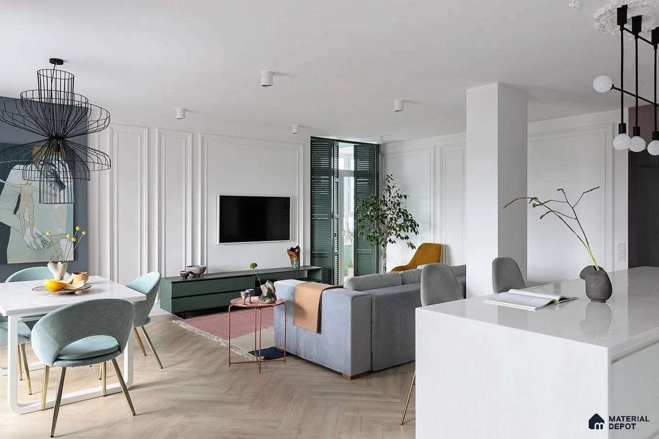 A spacious living room with contemporary furniture and floor-to-ceiling windows.